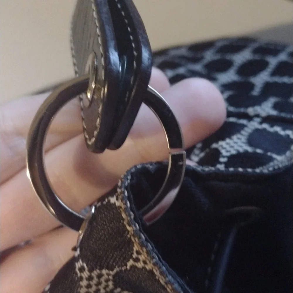 KATE SPADE BLACK WHITE SIGNATURE LOGO DRAWSTRING BUCKET HANDBAG